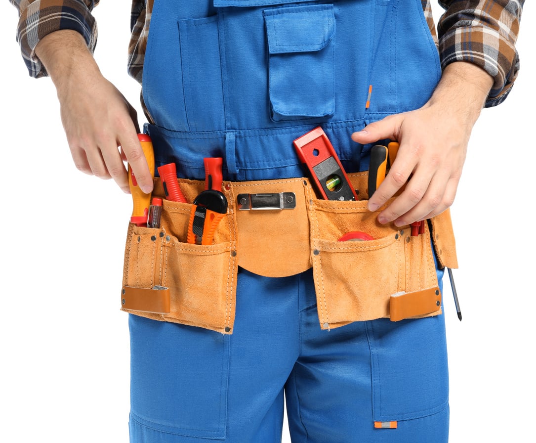 Male Electrician with Tools Belt on White Background, Closeup